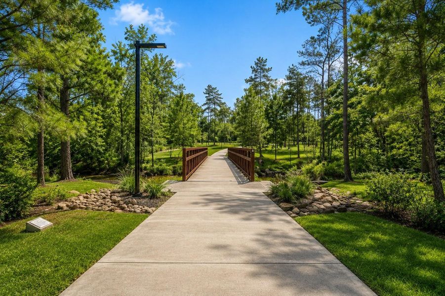 20 steps from your door is a scenic walking path continuing for MILES!