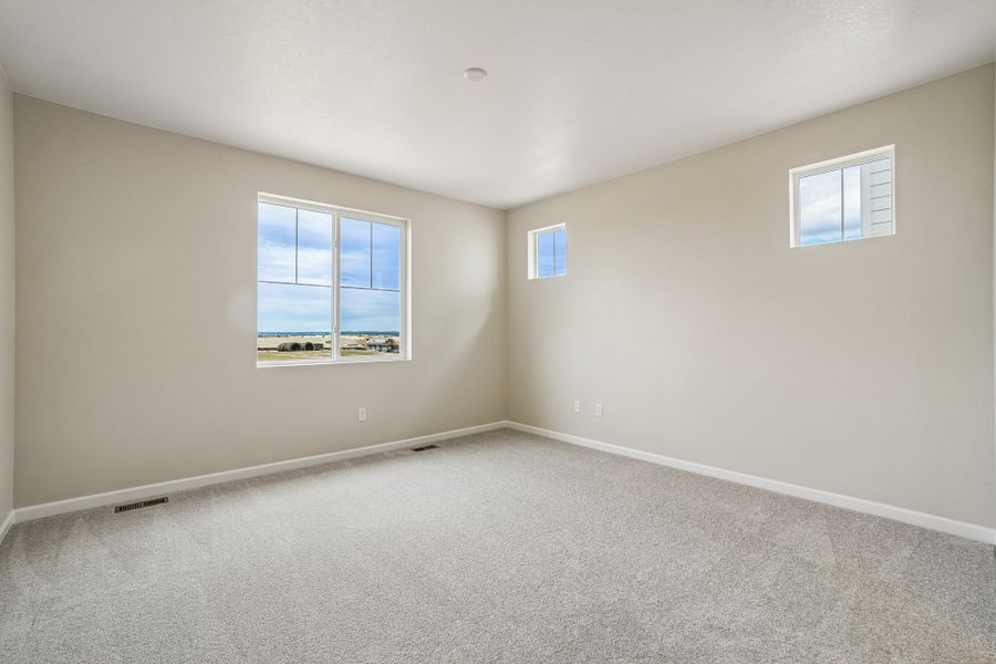 Spacious, unfurnished interior of a new home in Macanta, Castle Rock (Image 21).