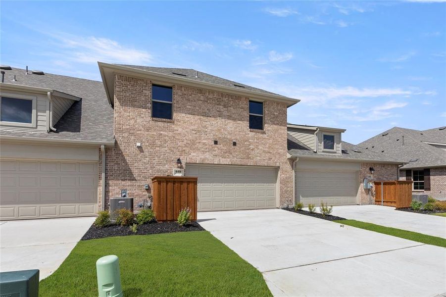 Front exterior of a new home in , Wylie, TX, highlighting curb appeal (Image 17). Front exterior of a new home in , Wylie, TX, highlighting curb appeal (Image 17).