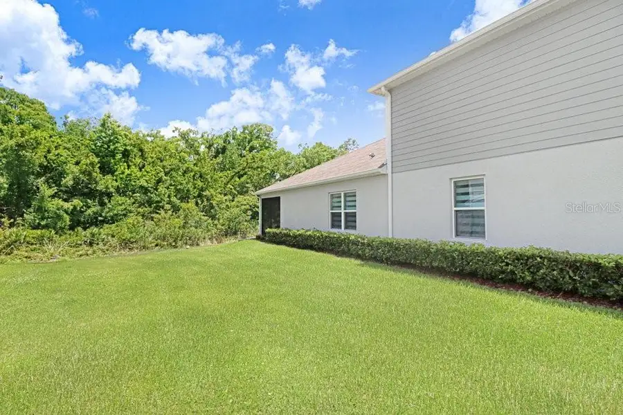 Exterior details and patio area of a home in , New Port Richey (Image 22).