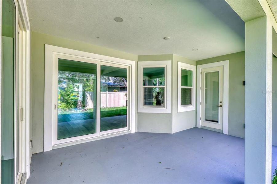 Exterior details and patio area of a home in , New Smyrna Beach (Image 29).