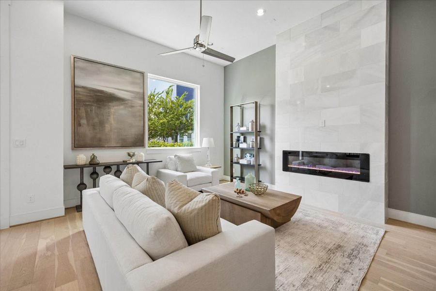 Lovely living room has beautiful natural light. Lovely living room has beautiful natural light.