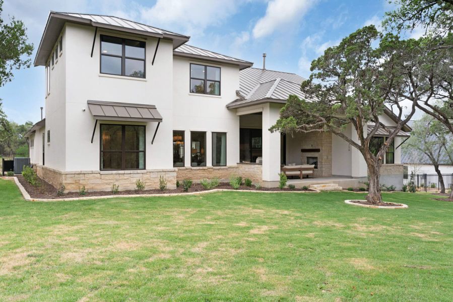 Exterior details and patio area of a home in Enchanted Bluff, Garden Ridge (Image 29).
