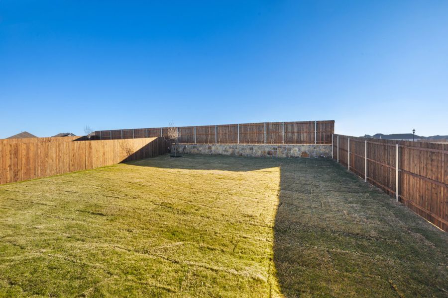 Exterior details and patio area of a home in Elevon, Lavon (Image 3).