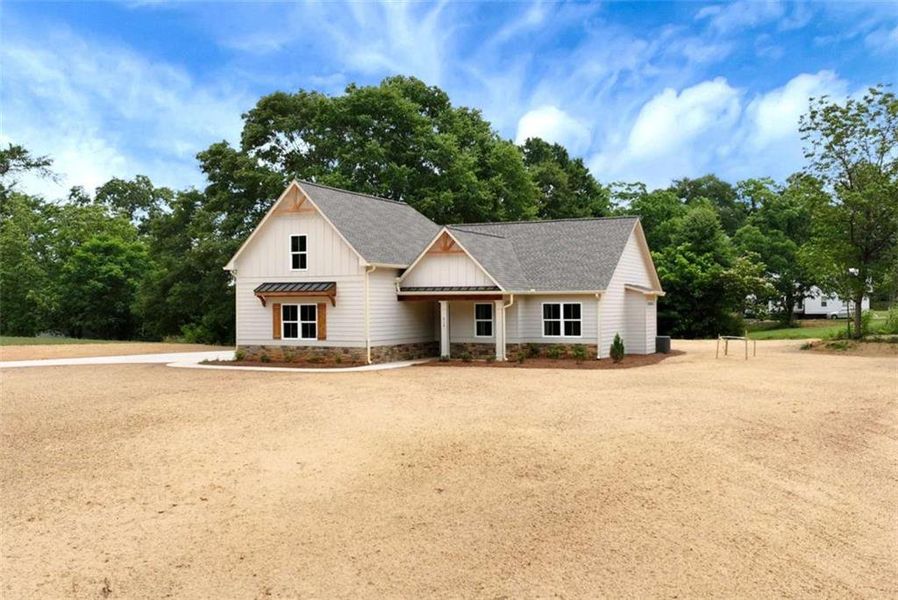 Front exterior of a new home in , Maysville, GA, highlighting curb appeal (Image 27).