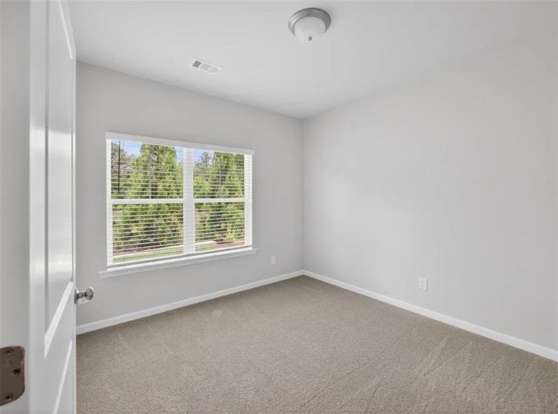 Spacious, unfurnished interior of a new home in Creekwood, Powder Springs (Image 24).