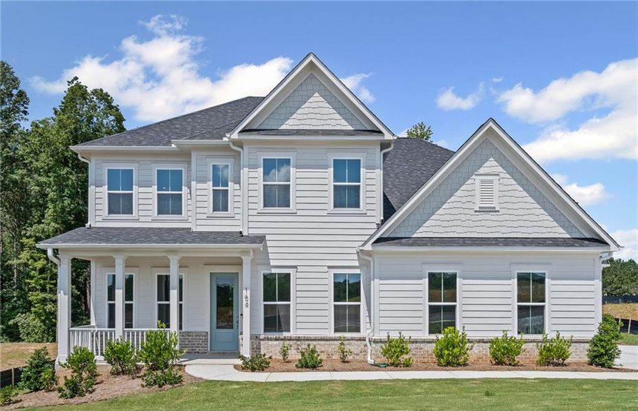Front exterior of a new home in Traditions of Braselton, Jefferson, GA, highlighting curb appeal (Image 2).