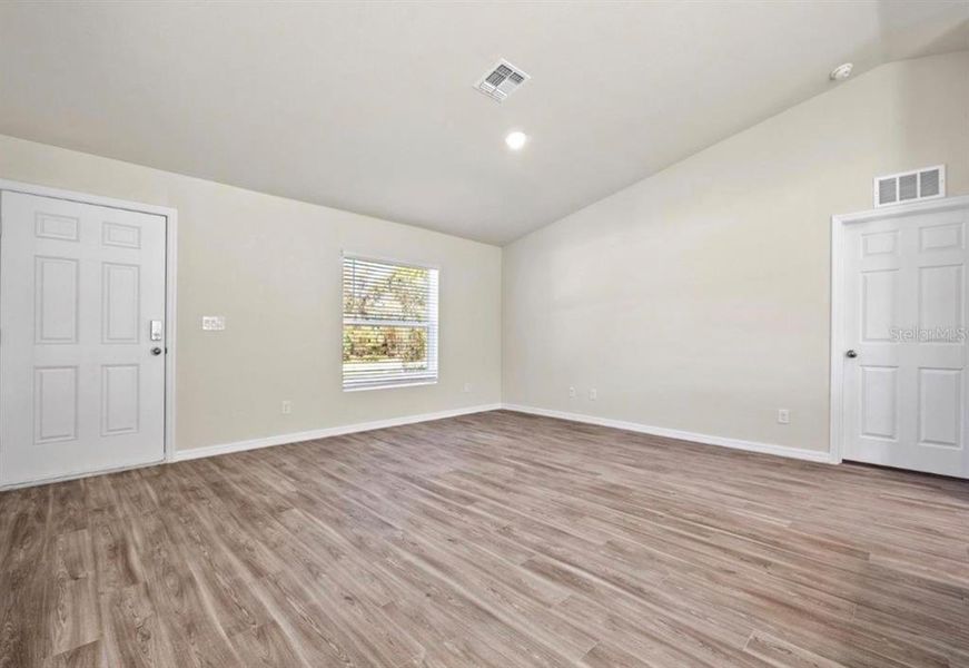 Spacious, unfurnished interior of a new home in , Port Charlotte (Image 13).