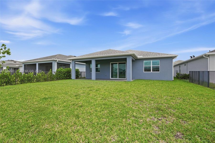 Exterior details and patio area of a home in Tradition, Port St. Lucie (Image 25).