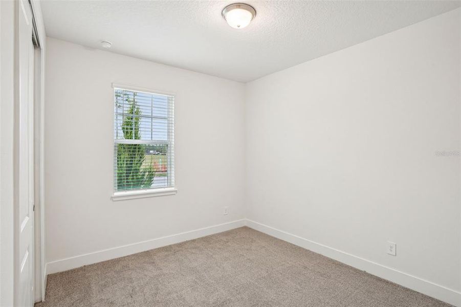 Spacious, unfurnished interior of a new home in Ridgehaven - Signature Series, Ormond Beach (Image 37).