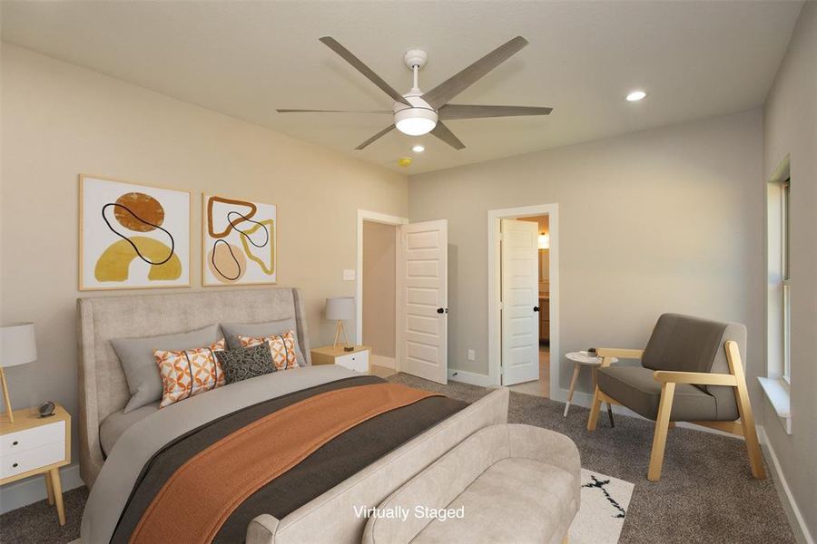 Bedroom with connected bathroom, carpet, and ceiling fan