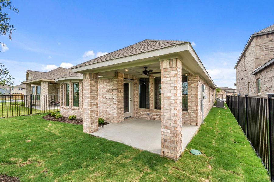 Exterior details and patio area of a home in Bridgeland, Cypress (Image 23).