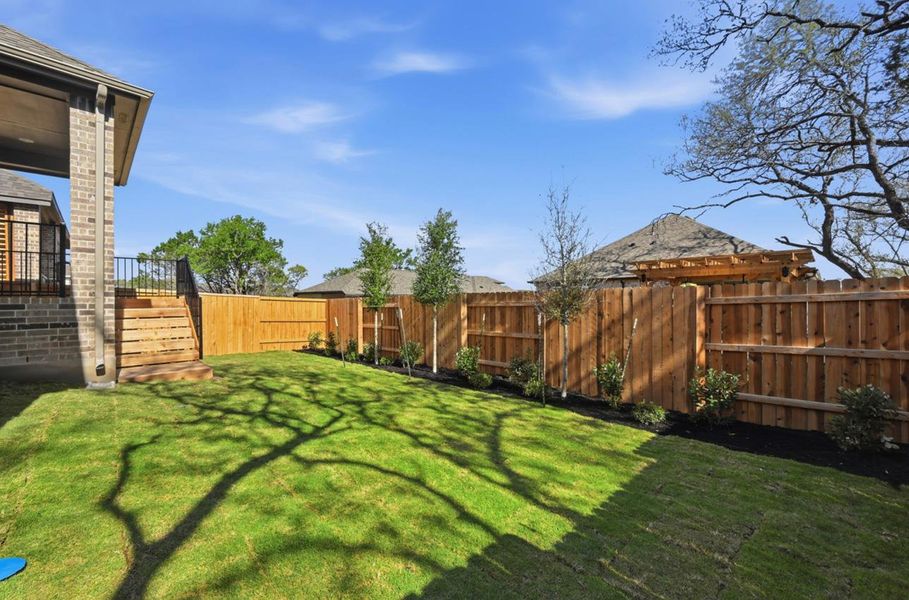 Exterior details and patio area of a home in 6 Creeks at Waterridge, Kyle (Image 16).