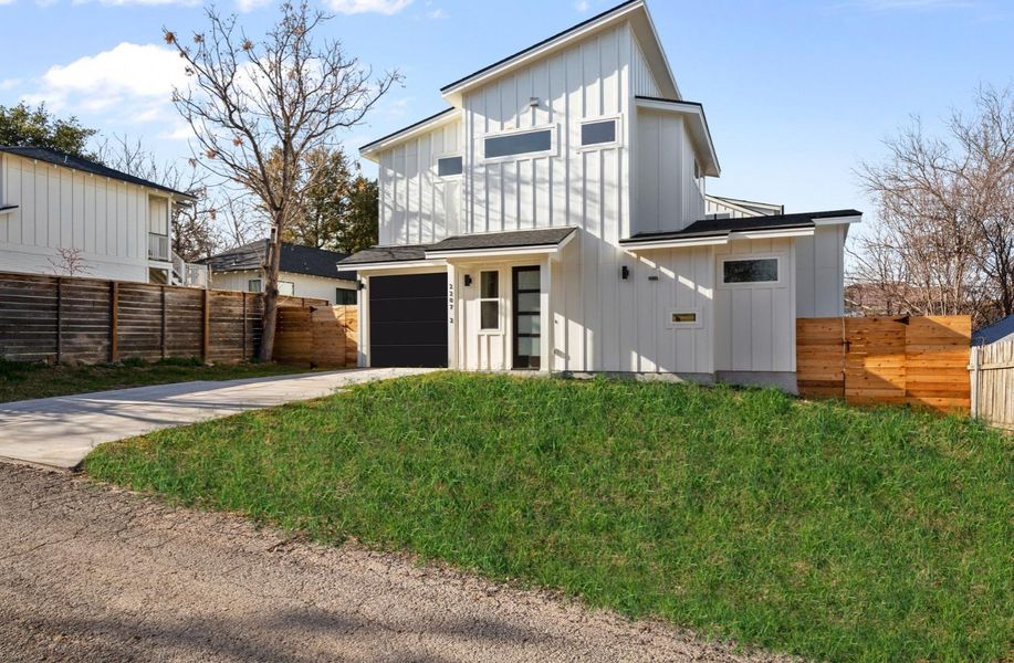 Rare 2 car tandem garage with additional parking in driveway