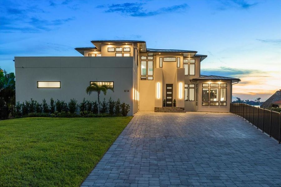 Front exterior of a new home in , Osprey, FL, highlighting curb appeal (Image 20).