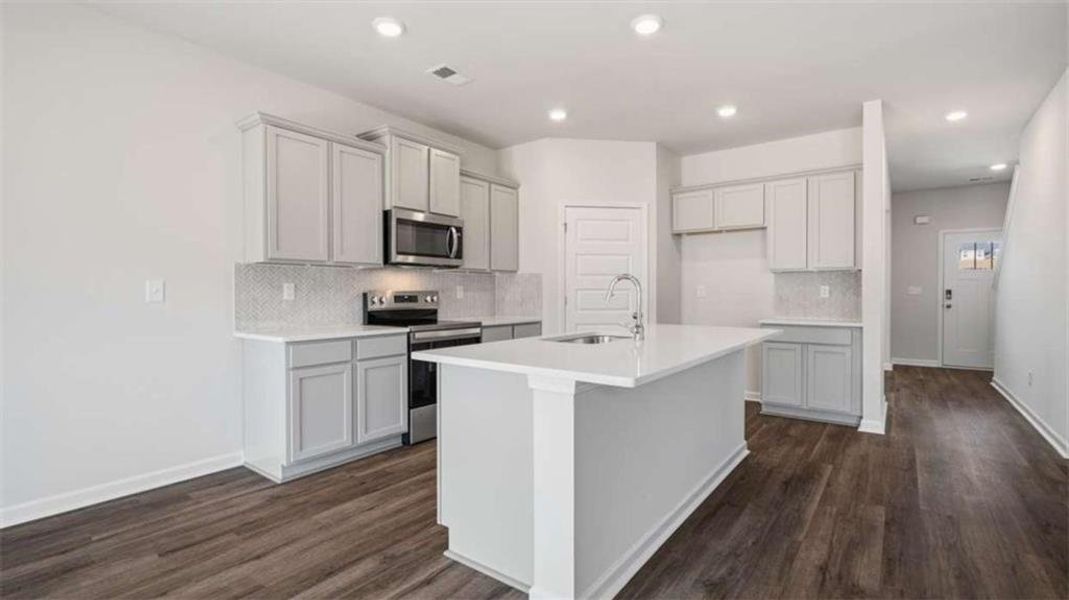 Furnished interior view inside a new home in The Preserve at Agricultural Village, Perry (Image 4).