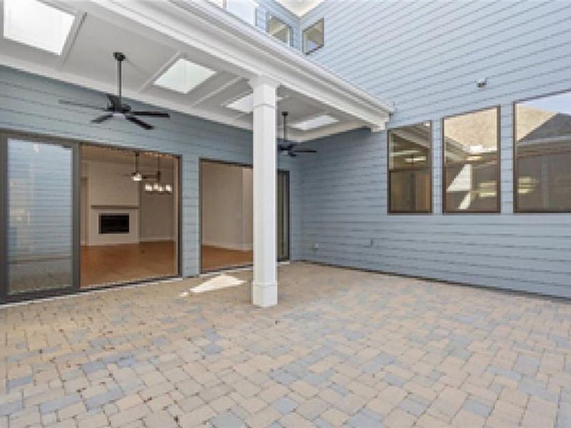 Exterior details and patio area of a home in The Village at Towne Lake, Woodstock (Image 2).