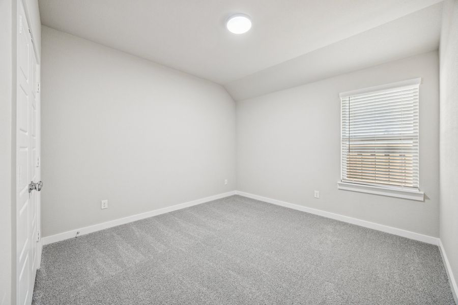 Bedroom in the Oscar home plan by Trophy Signature Homes – REPRESENTATIVE PHOTO Bedroom in the Oscar home plan by Trophy Signature Homes – REPRESENTATIVE PHOTO