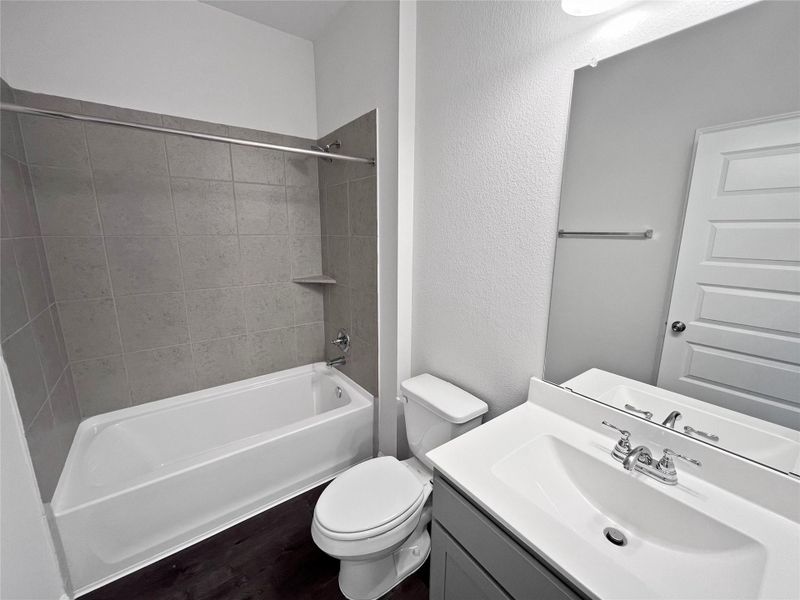 The Crawford- Secondary Bathroom. Home under construction. Sample floor plan photo used for illustrative purposes only. Upgrades, selections options, windows and colors may vary. The Crawford- Secondary Bathroom. Home under construction. Sample floor plan photo used for illustrative purposes only. Upgrades, selections options, windows and colors may vary.