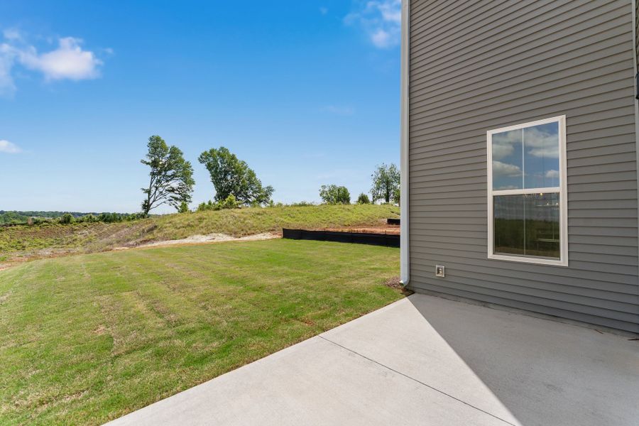 Exterior details and patio area of a home in Landmark Commons, Boiling Springs (Image 4).