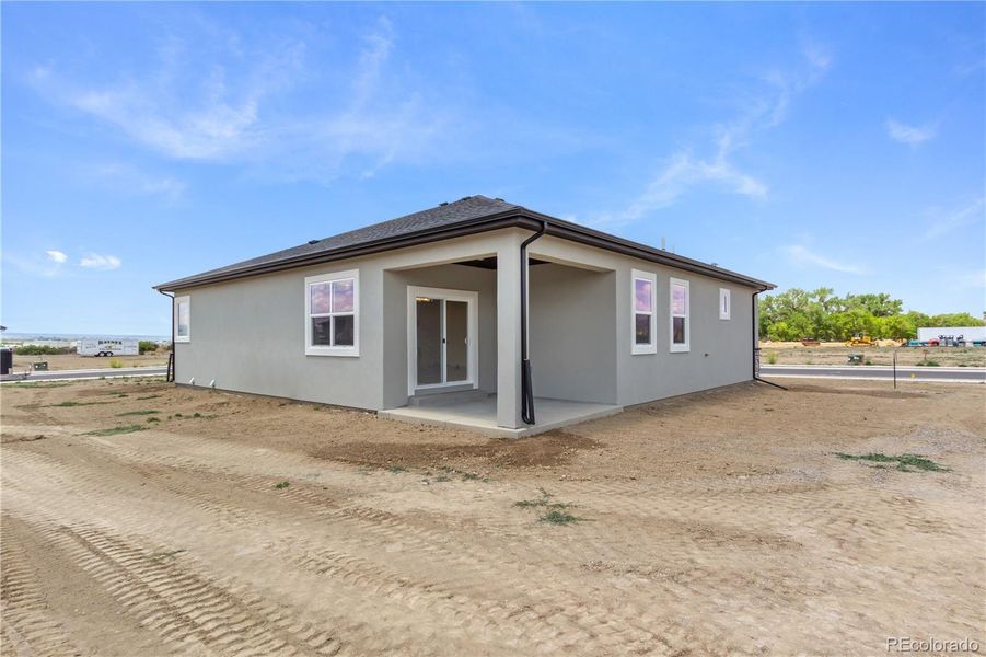 Front exterior of a new home in , Montrose, CO, highlighting curb appeal (Image 26). Front exterior of a new home in , Montrose, CO, highlighting curb appeal (Image 26).