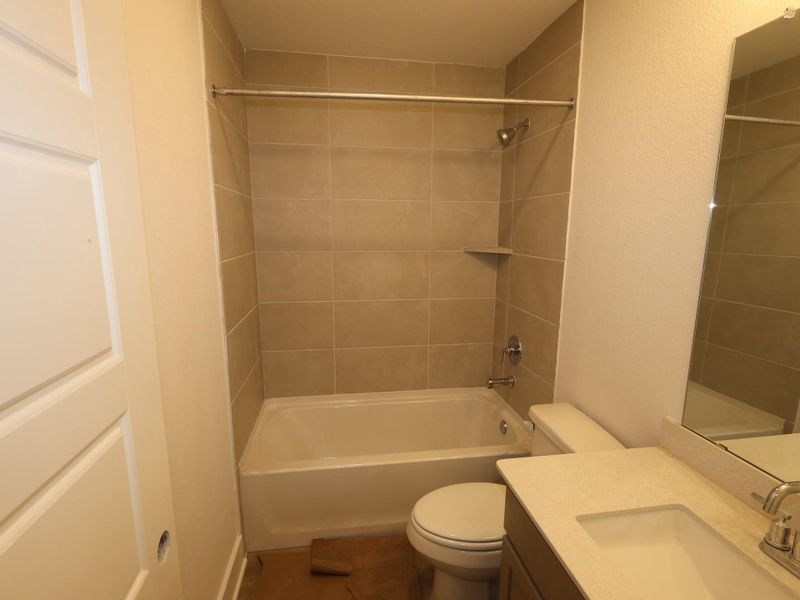 Furnished interior view inside a new home in Lone Star Landing, Montgomery (Image 6).