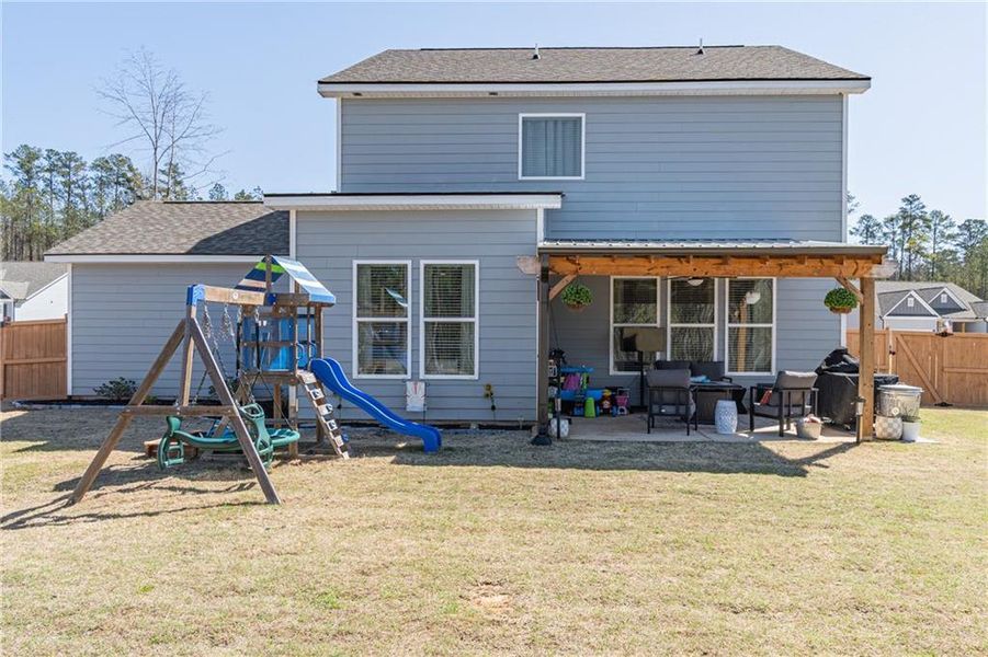 Exterior details and patio area of a home in River Station, Monroe (Image 3).
