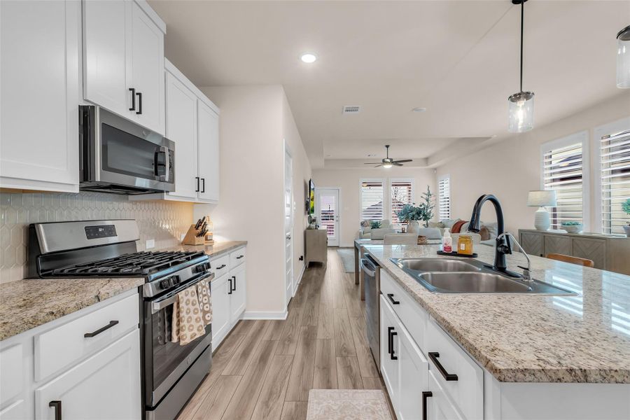 An open layout flows into a bright living area An open layout flows into a bright living area