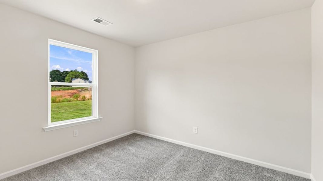 Spacious, unfurnished interior of a new home in Village 3, Woodruff (Image 26).