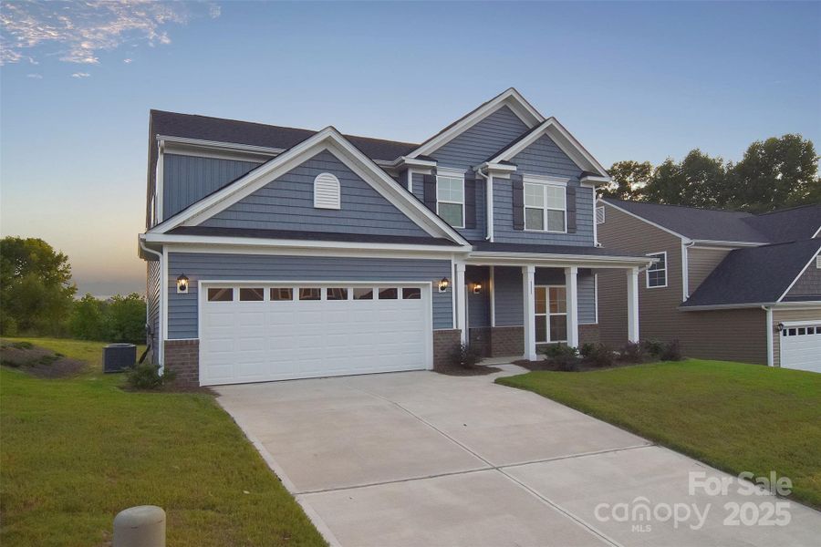 Front exterior of a new home in Larkin, Statesville, NC, highlighting curb appeal (Image 2).