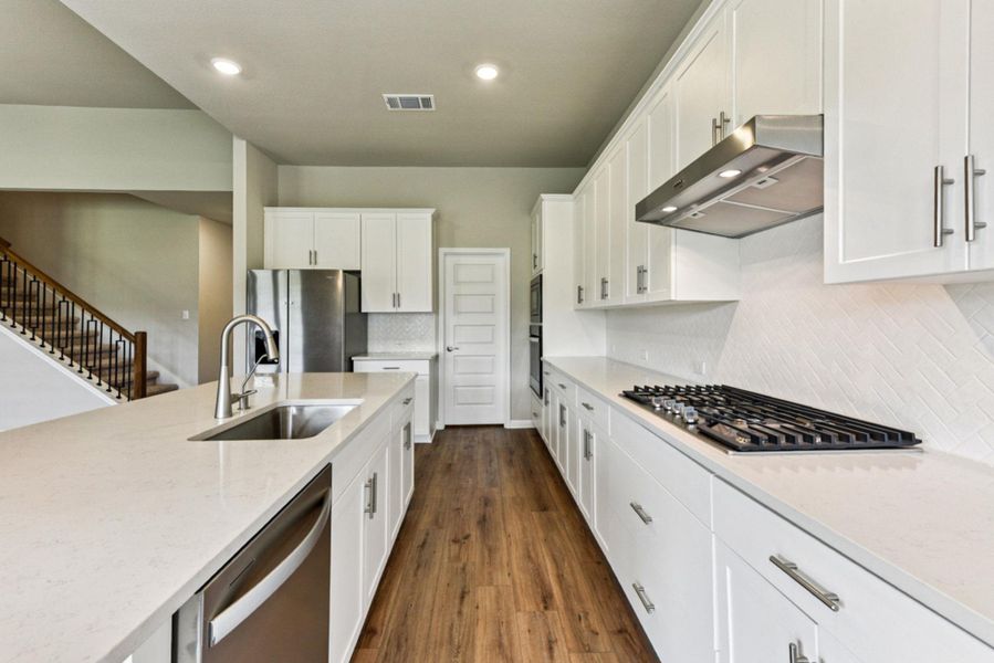 Stone counters with stainless steel appliances & 5 burner gas stove