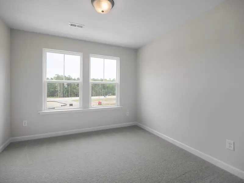 Spacious, unfurnished interior of a new home in Forestville Yard Townhomes, Knightdale (Image 20).