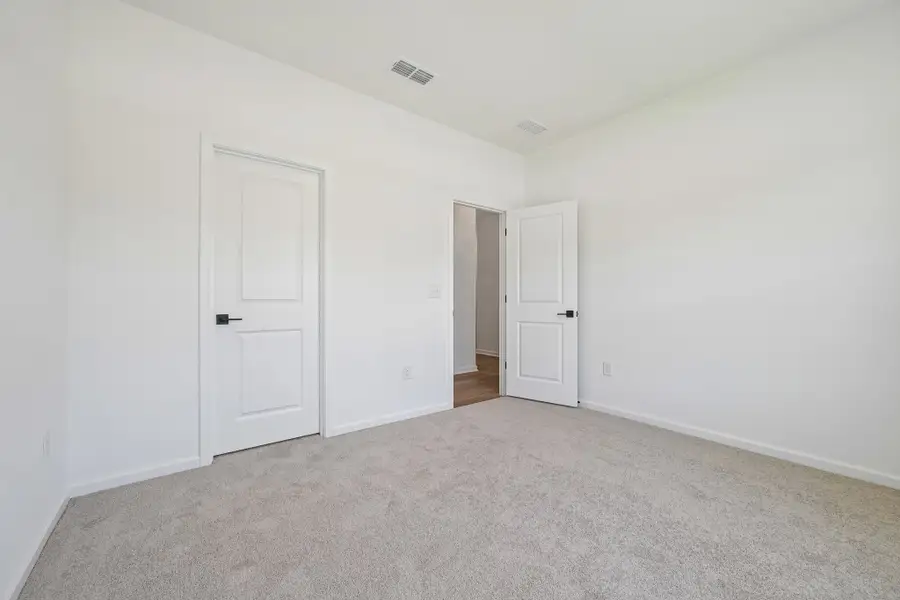 Representative unfurnished interior of a home built from the Craven by Ashton Woods in Crescent Mills, Wilson's Mills (Image 17). Representative unfurnished interior of a home built from the Craven by Ashton Woods in Crescent Mills, Wilson's Mills (Image 17).