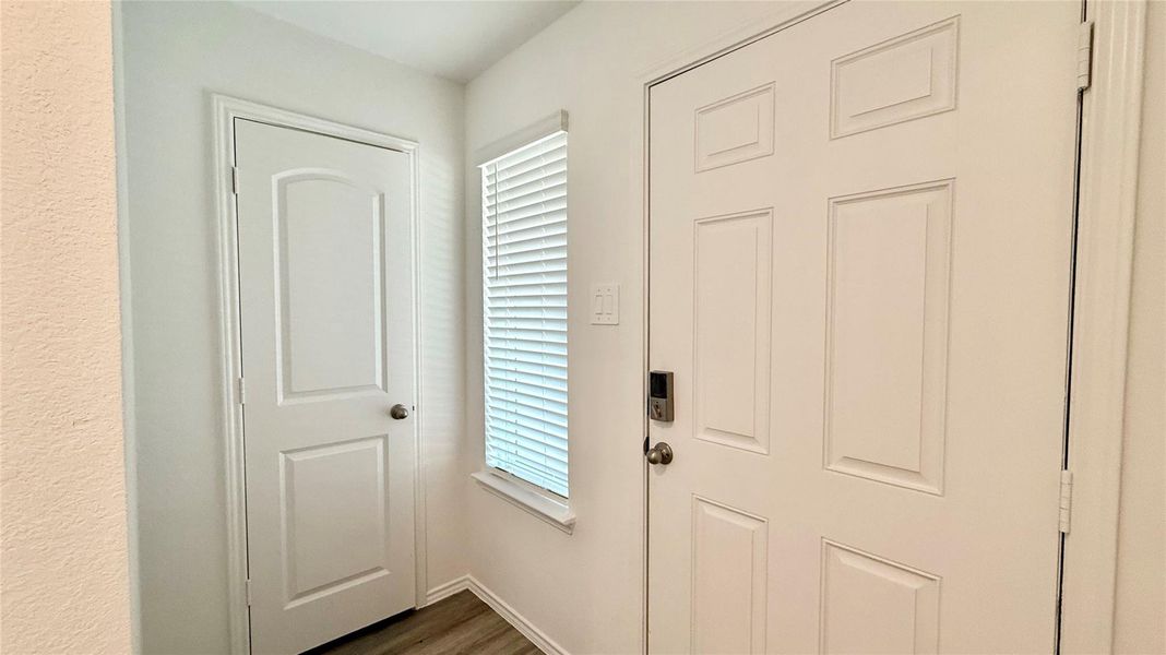 Front entry with convenient coat closet.