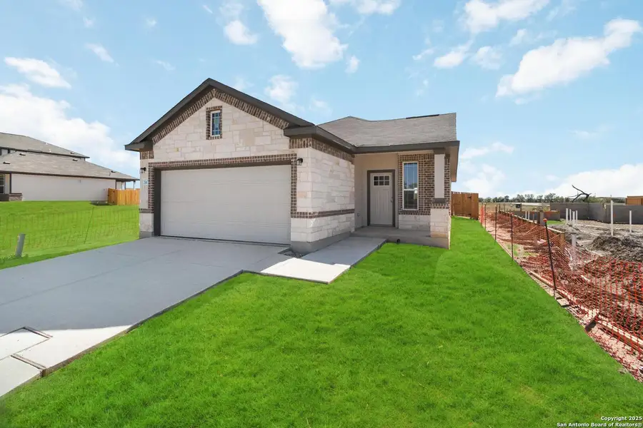 Front exterior of a new home in Applewhite Meadows, San Antonio, TX, highlighting curb appeal (Image 2).