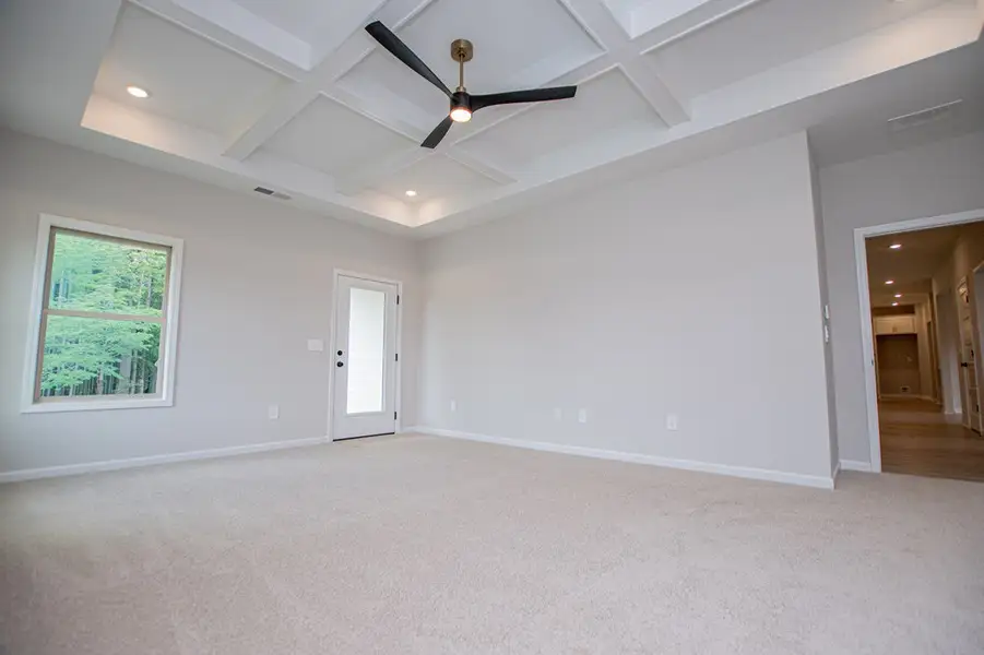 Spacious, unfurnished interior of a new home in WOODMONT RESERVE, Roopville (Image 55).