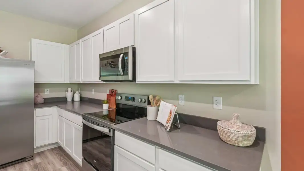 Furnished interior view inside a new home in Towns at Woodsdale, Wesley Chapel (Image 15).