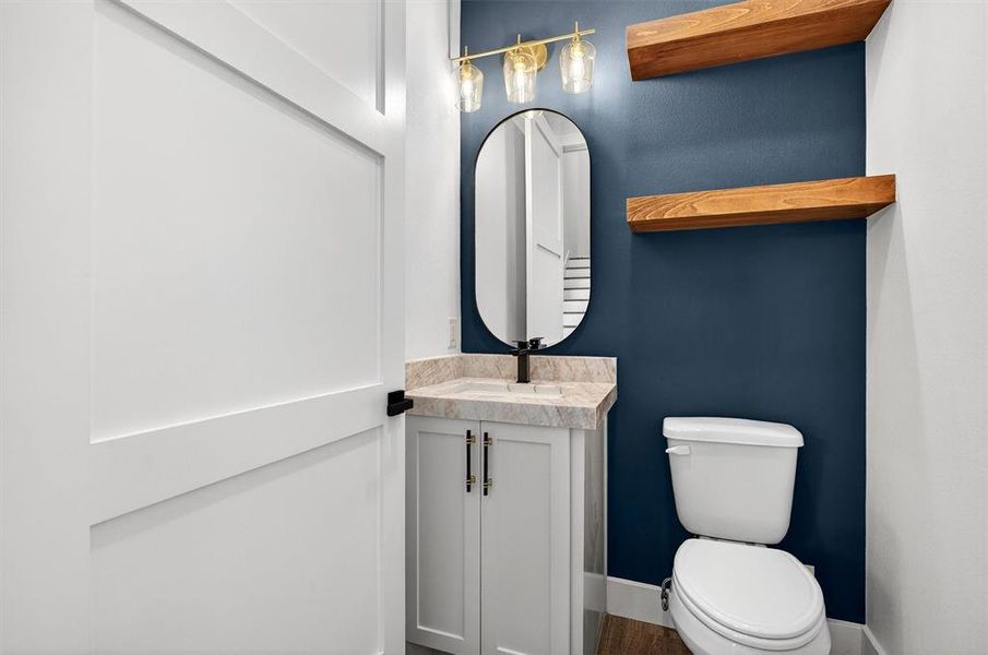 Bathroom with vanity and toilet