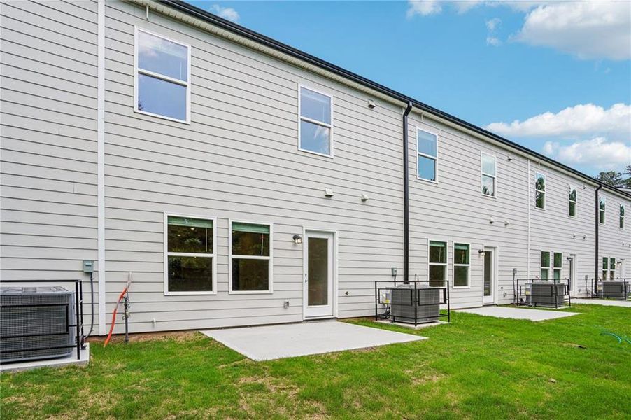 Exterior details and patio area of a home in Artisan Walk, Fairburn (Image 23).