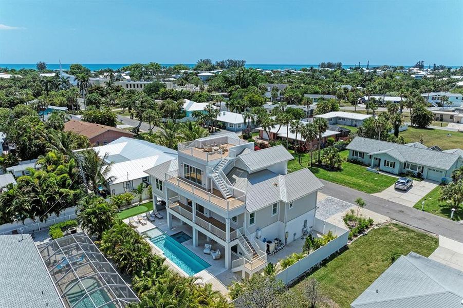 Front exterior of a new home in , Holmes Beach, FL, highlighting curb appeal (Image 21).