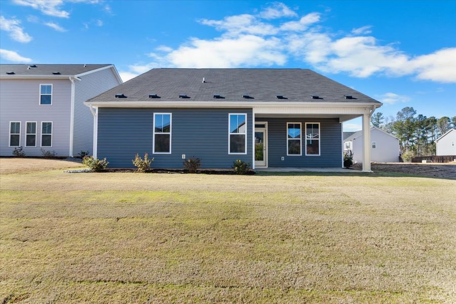 Exterior details and patio area of a home in Windsor, North Augusta (Image 24).