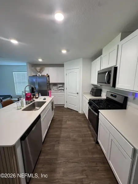 Furnished interior view inside a new home in Entrada, St. Augustine (Image 7).