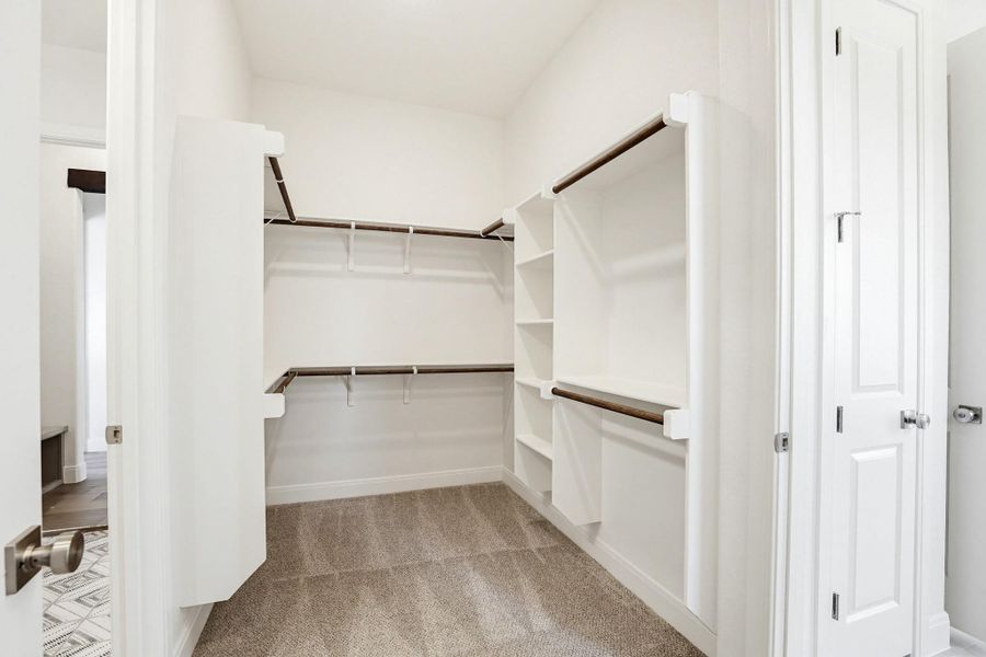 Ample storage solutions define this well-appointed closet, ready for personalized organization.