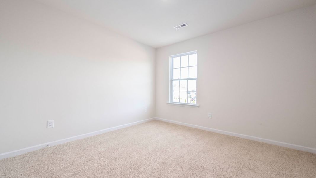 Spacious, unfurnished interior of a new home in North Village Townes, Greensboro (Image 22).