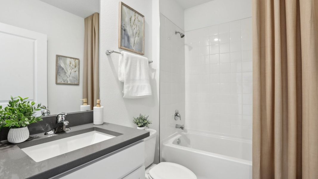 Representative furnished interior of a home built from the Allex II by D.R. Horton in Deerbrook, Land O' Lakes (Image 20).