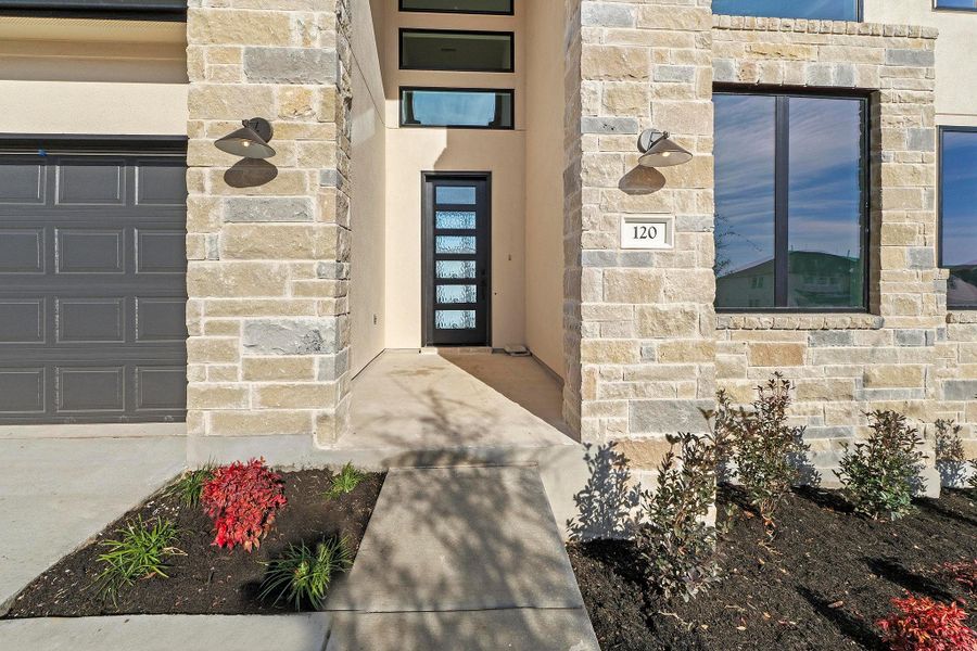 Exterior details and patio area of a home in Lariat, Liberty Hill (Image 3).