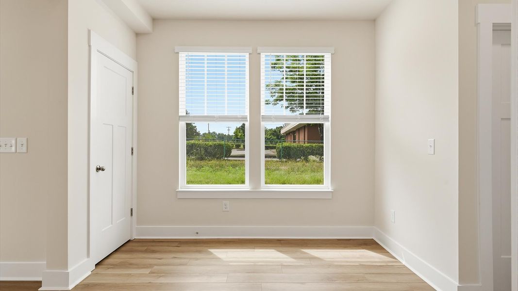 Inviting breakfast area with a seamless connection to the kitchen for everyday living at the Clarke Townes community