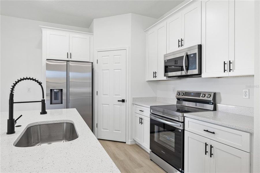 Furnished interior view inside a new home in , Poinciana (Image 9).