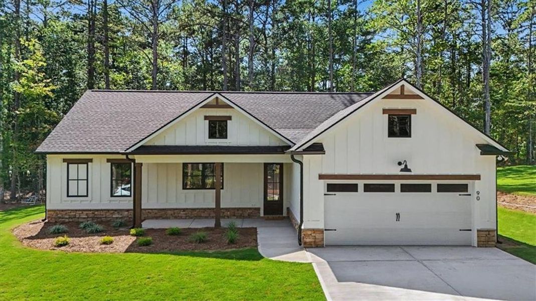 Front exterior of a new home in , Dallas, GA, highlighting curb appeal (Image 2). Front exterior of a new home in , Dallas, GA, highlighting curb appeal (Image 2).