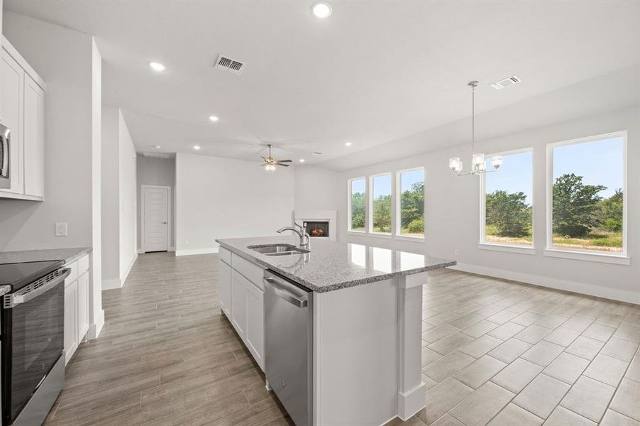 Furnished interior view inside a new home in Saddleback Estates, Boyd (Image 6).
